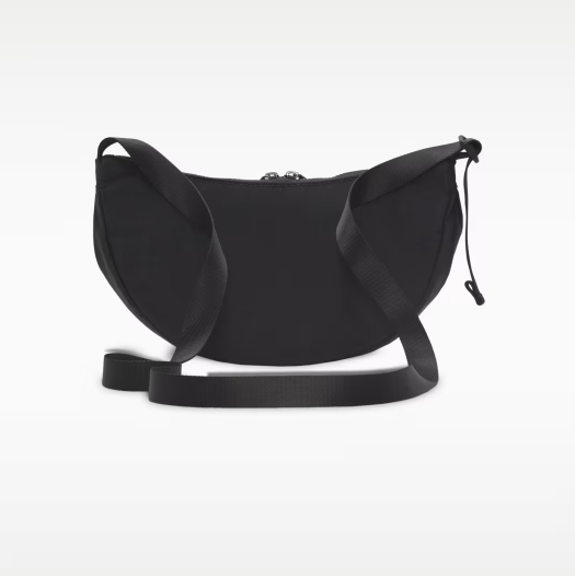 Nike AURA practical crescent-shaped crossbody bag for summer storage with zippered pockets and adjustable shoulder strap – Black/Black/Gunmetal